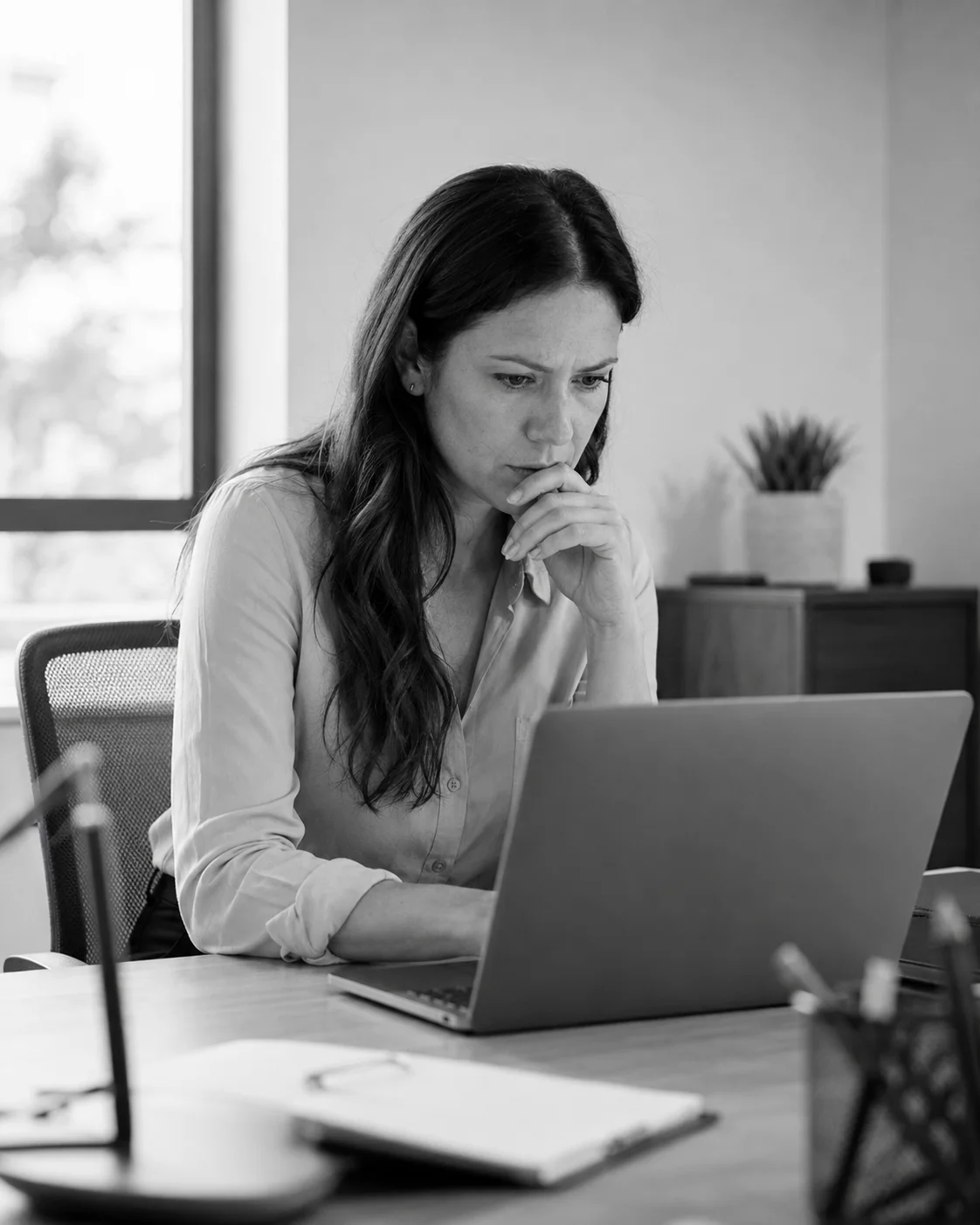 Operations manager reviewing customer context before routing a call