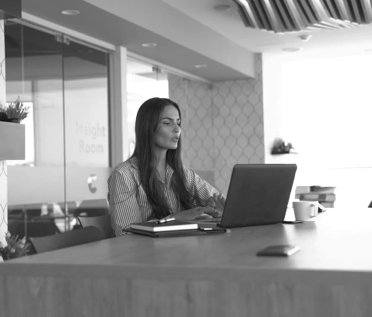 Operations manager reviewing customer context before routing a call